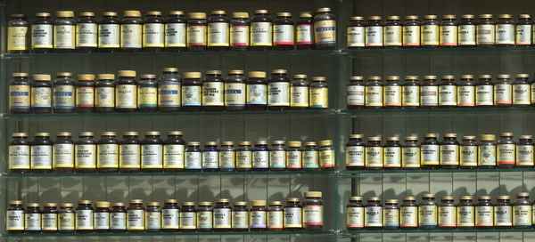pharmacy shelf loaded with supplements